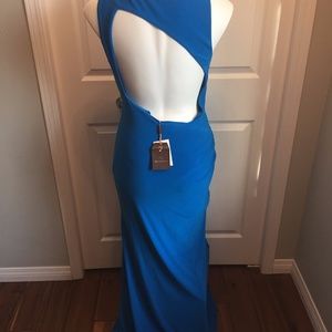 Designer dress, new with tags, size 8, lined, elegant yet simple.